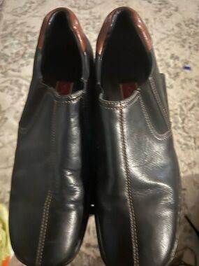 Cole Haan Black Leather Slip-On Loafers with Brown Heel Accent
